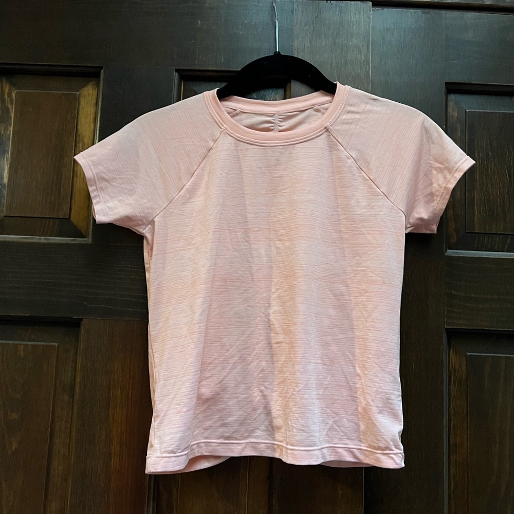 Never worn Athleta girl a peachy color  tshirt